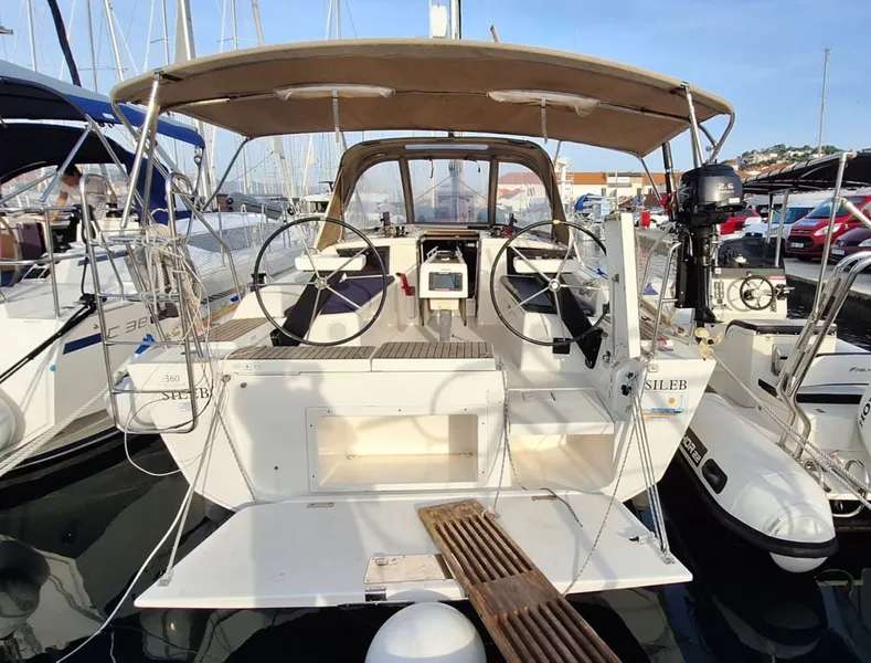 The Dufour 360 &ldquo;Sileb&rdquo; on her berth at ACI Marina Trogir, passerelle down, twin wheels in the cockpit.